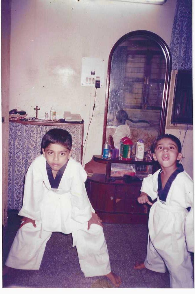 Childhood photo of Neil in a martial arts uniform
